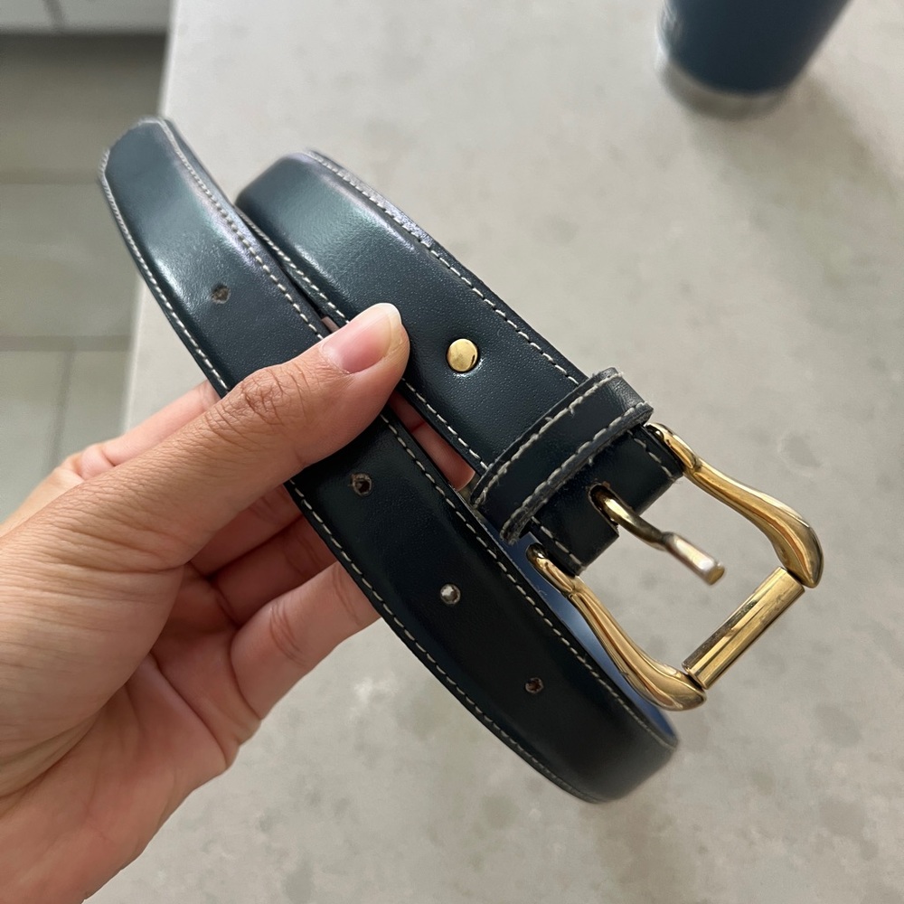 Navy blue belt with gold hardware